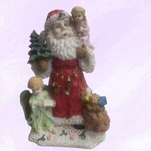 Da General Trade Spa figurine of Santa Claus with a child on his shoulder tree